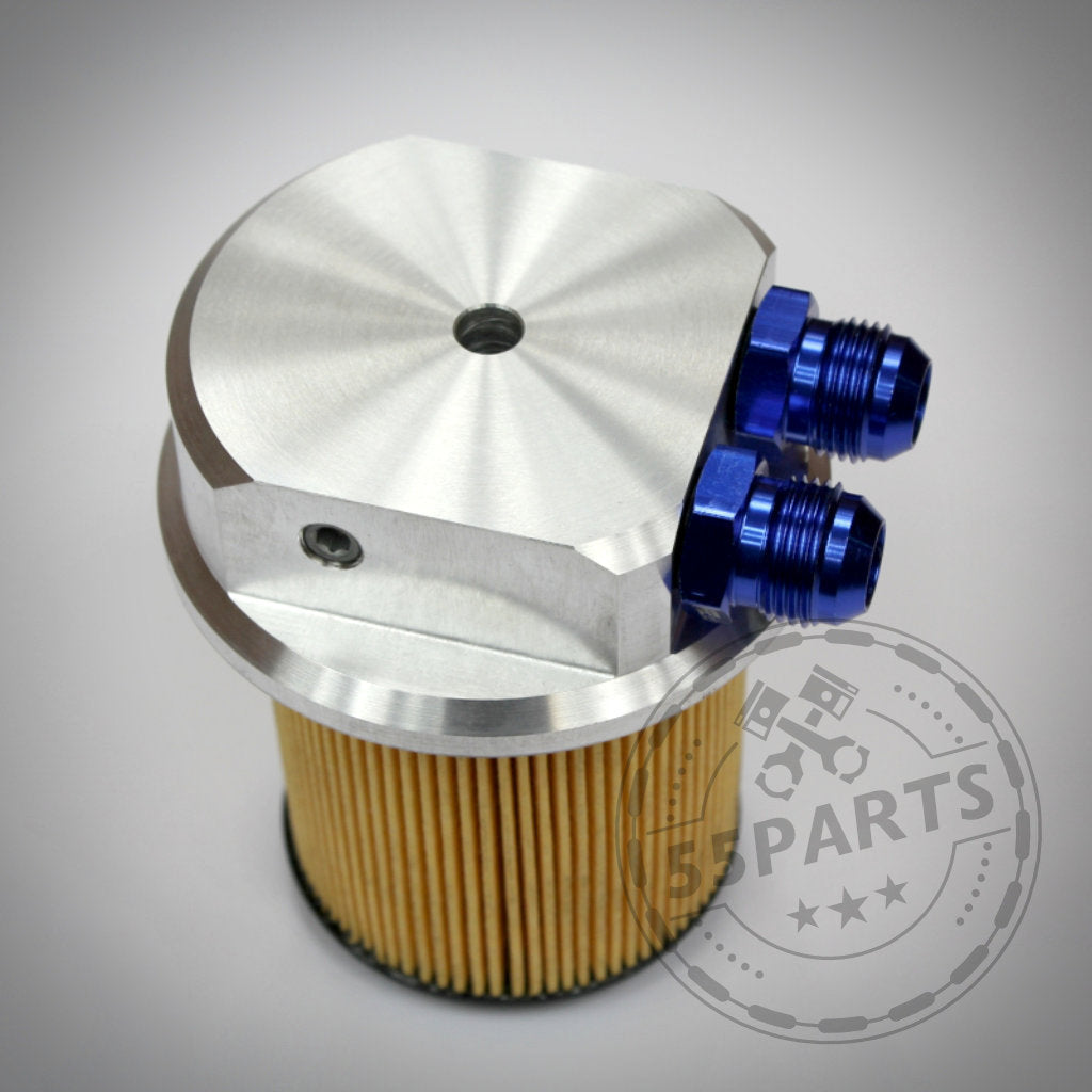Adapterkappe externer Ölkühler- AN10 + 1,8" NPT, passend für BMW M50/M52, CNC-gefräst mit blauen Anschlüssen auf weißem Hintergrund – geeignet für externe Ölkühleranwendungen.